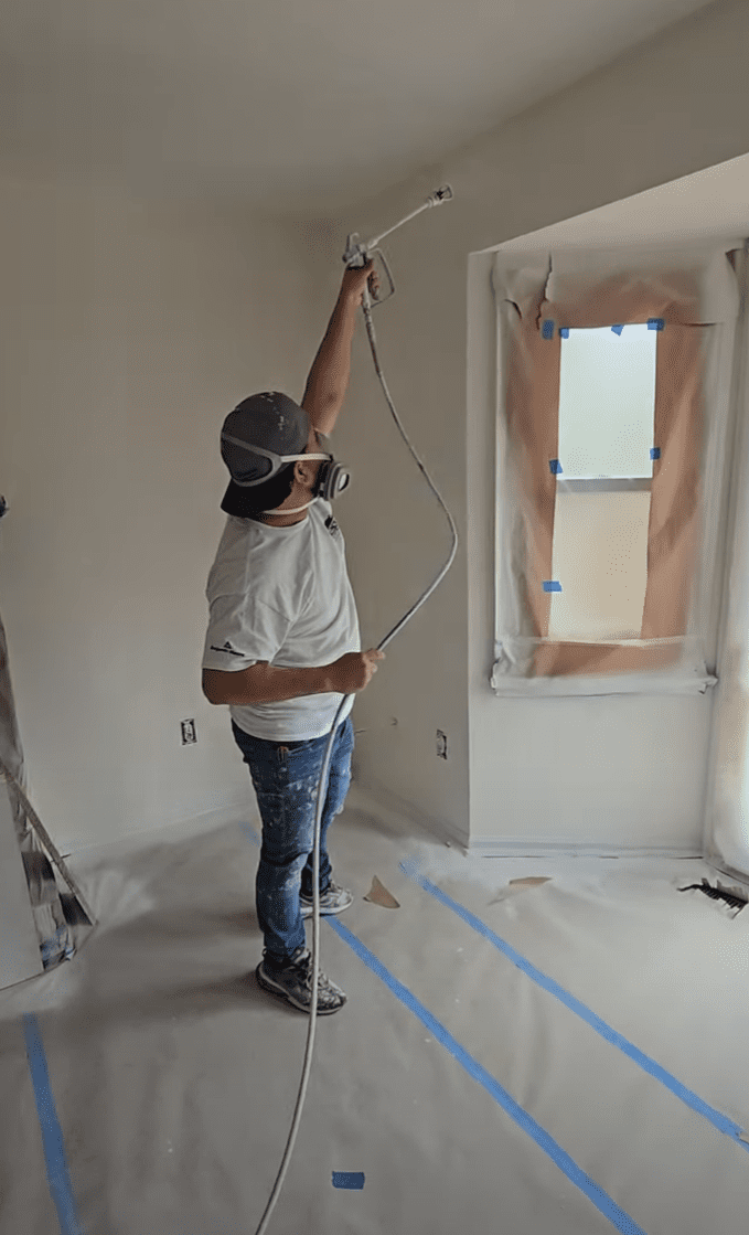 Eye-level view of freshly painted wall with primer